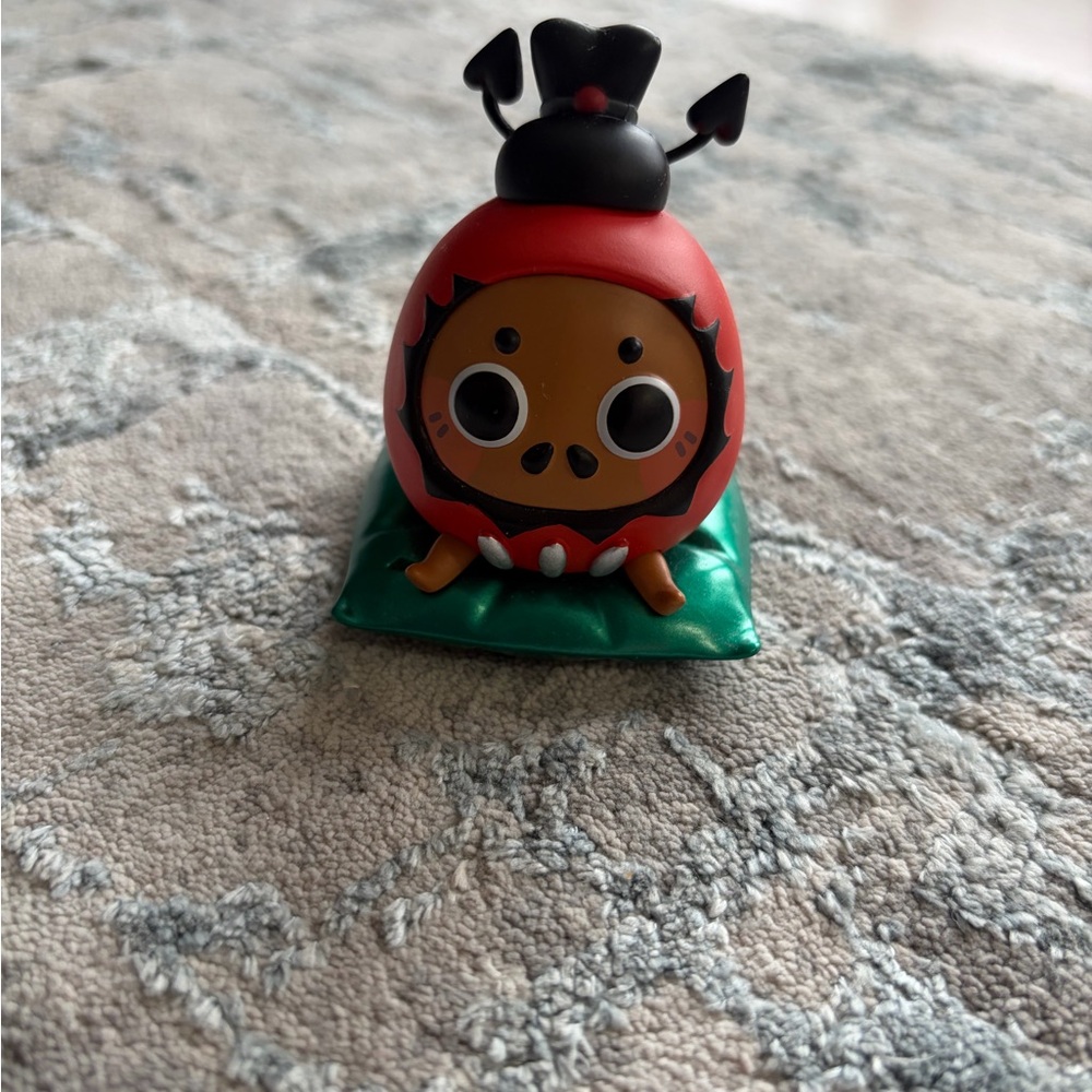 Kawaii Red Bug Character Figurine on Green Base